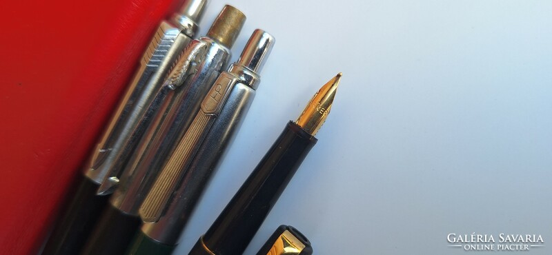 4 Ballpoint pens + a Parker fountain pen