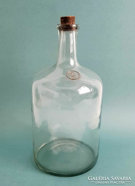 Old blown 3 liter glass bottle