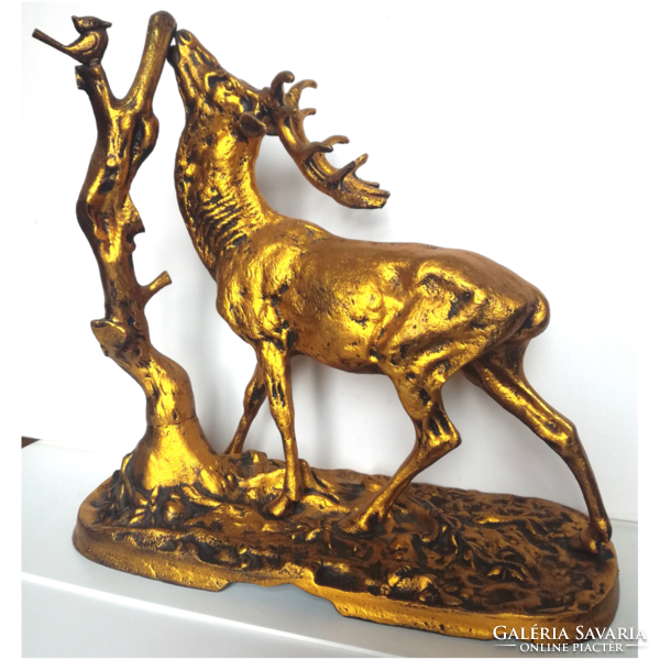 Large golden deer statue