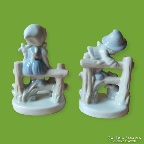 Porcelain girl and boy figures in pairs