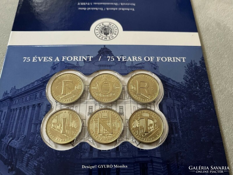 The first day's decoratively wrapped mints of the circulation coin commemorative versions