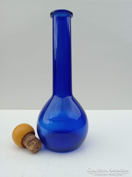 Glass bottle with cobalt blue stopper