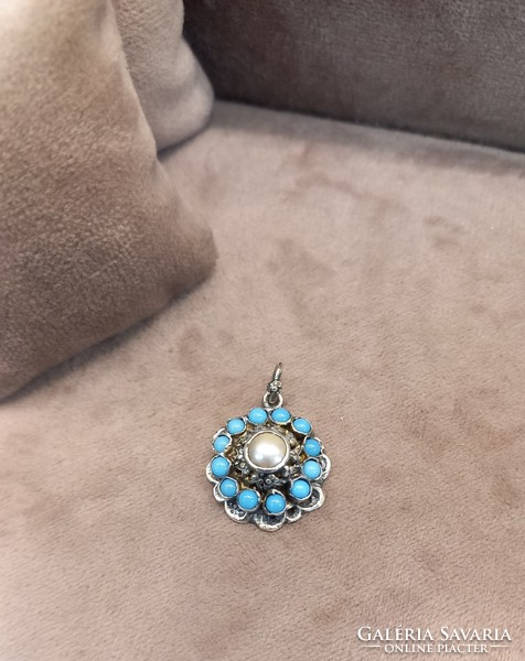 Antique silver pendant with turquoise stones