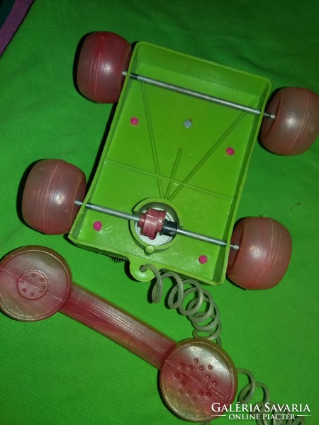 Old Hungarian small-scale traffic goods rattling pullable plastic toy telephone as shown in the pictures