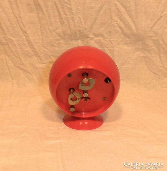 Mom space age alarm clock with globe inscription. Red.