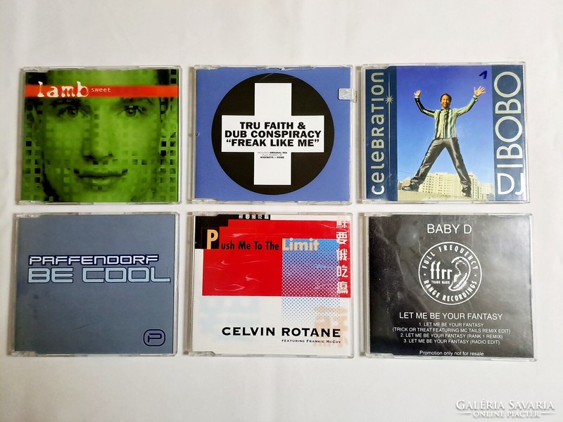 61 old, original music CDs mixed together