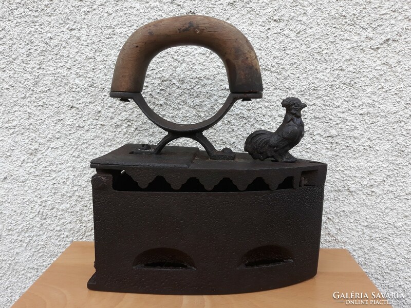 Antique cast iron iron with rooster