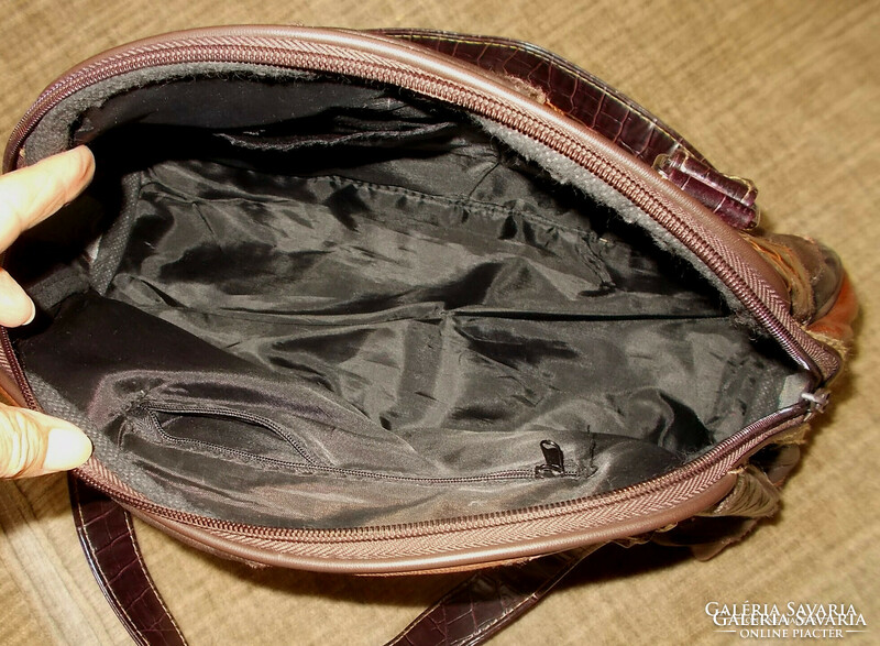 Retro bag made of leather pieces.