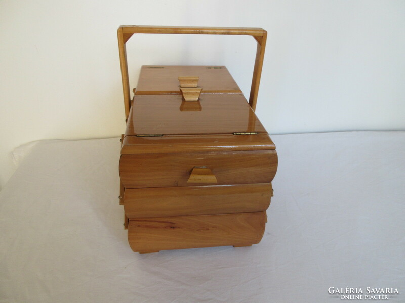 Old, solid wood, 3-story, art deco sewing chest.. Negotiable!.