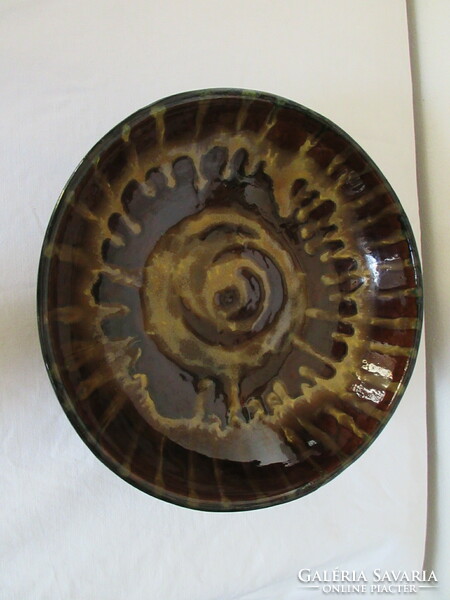Old, marked, ceramic wall plate. Negotiable!