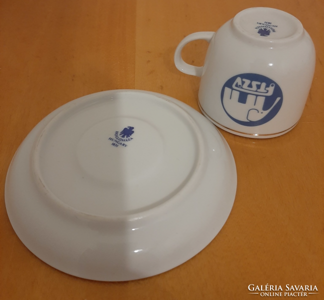Hollóházi ftszv is the capital's settlement cleaner and environmental defender. Kft. Coffee cup with logo and saucer