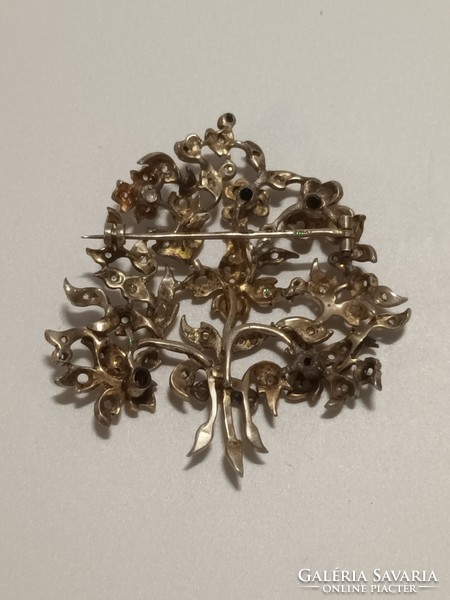 Larger silver brooch with stones