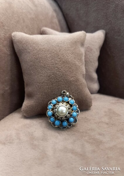 Antique silver pendant with turquoise stones