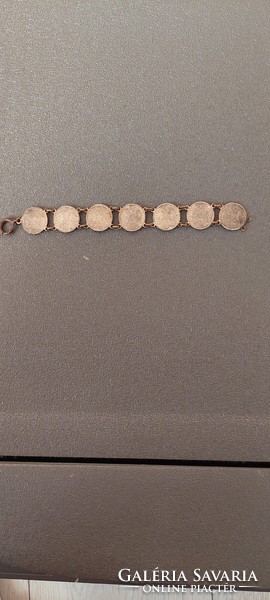 It could have been an antique bracelet or pocket watch chain