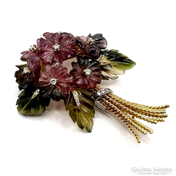 0234. Vintage flower brooch made of precious stones