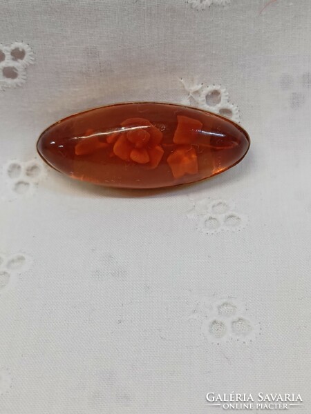Vintage Baltic amber brooch with carved pattern