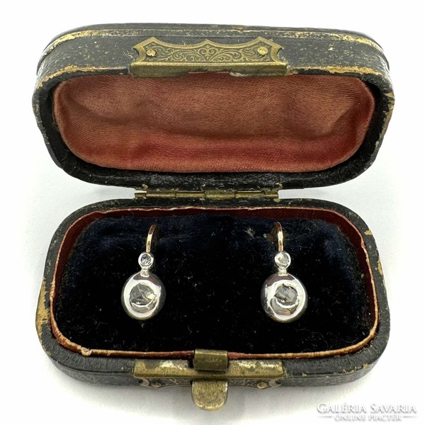 Old 14 carat gold stud earrings with diamonds!