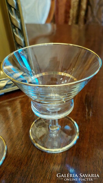 2 old glass cocktail glasses.