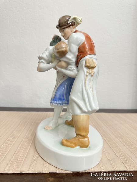 Herend watering cans, a pair of porcelain figurines watering.