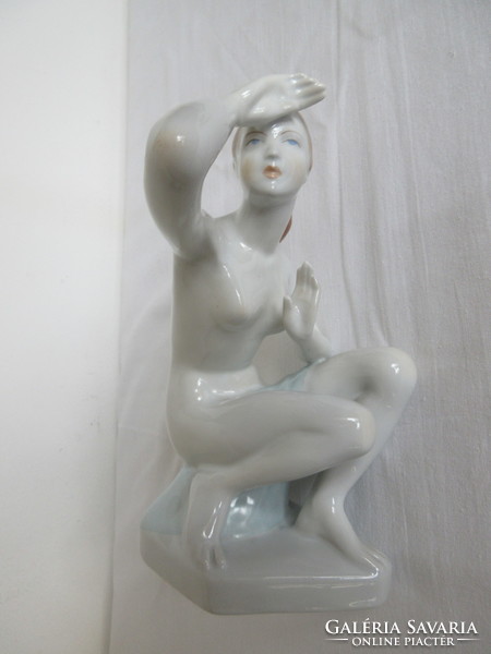 Old, rare porcelain nude figure looking into the distance. Negotiable!