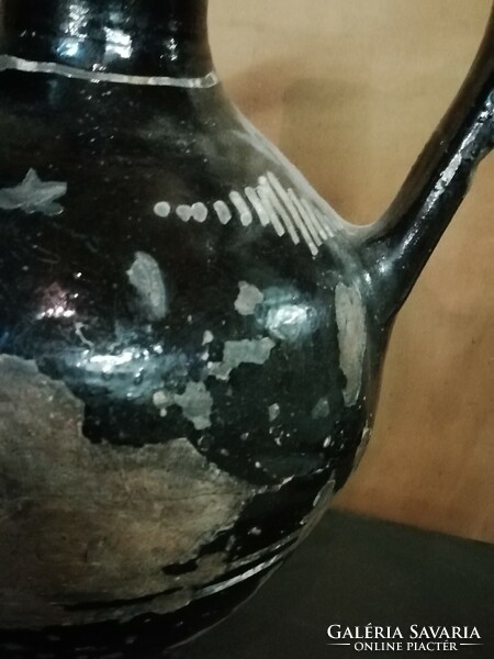 Antique black ceramic jug
