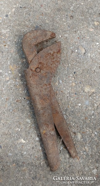 Retro maybe pipe wrench.