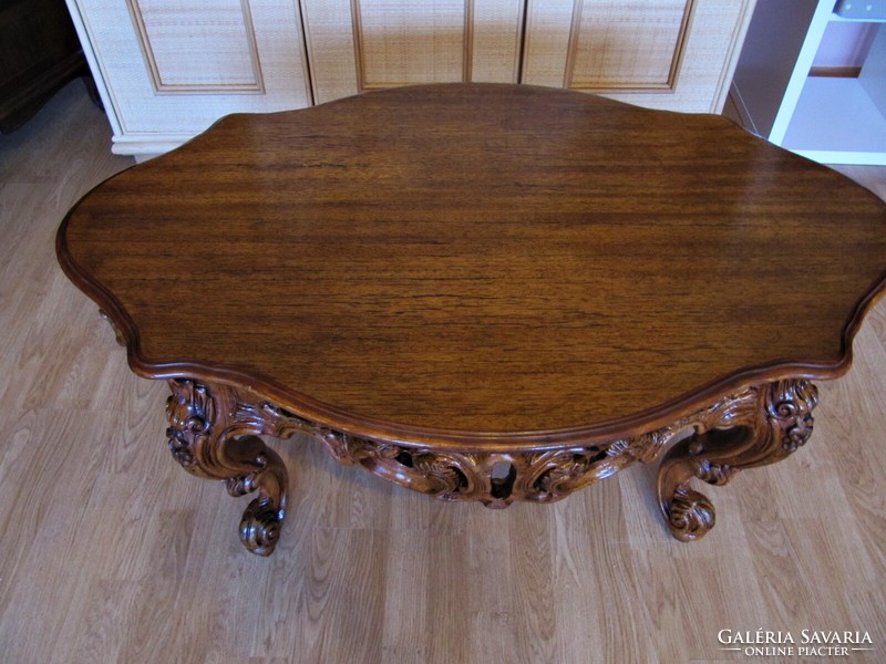 Richly carved baroque style table