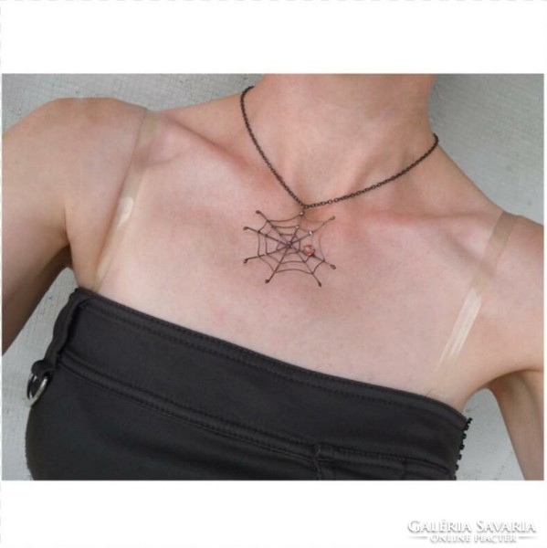 Handmade pendant in the shape of a spider's web