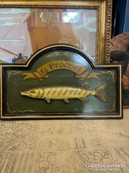 Wooden wall picture depicting a pike