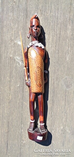 African carved wooden warrior statue