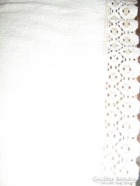Beautiful hand-embroidered cross-stitched lace tablecloth