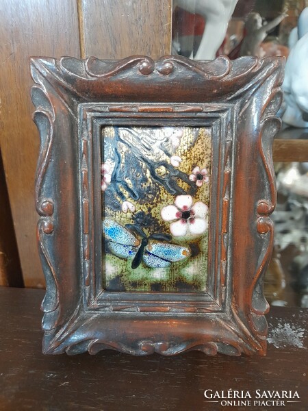Old Dutch floral, butterfly fire enamel marked picture, in a wooden frame.