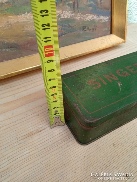 Singer metal box with parts