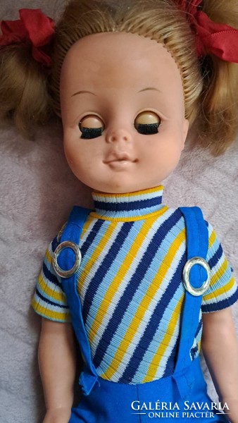 Old blinky baby. In a blue dress. Size: 45 cm
