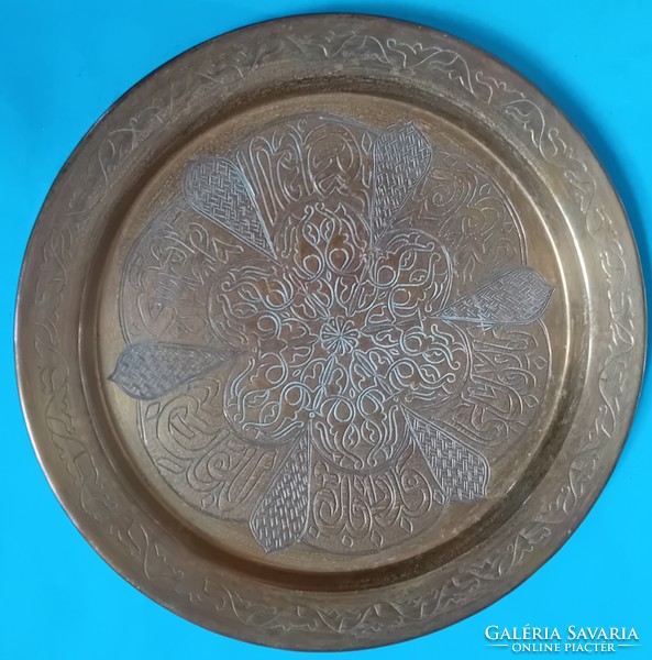 Old copper bowl, hand-engraved
