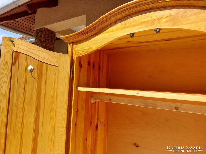 A pine cupboard with shelves and hangers from Sziged is for sale. Furniture is in good condition, completely made of pine