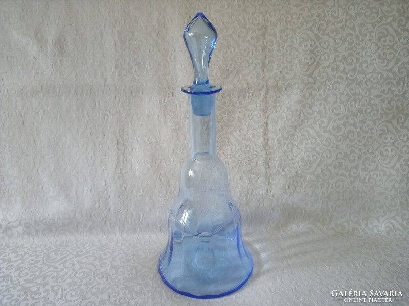 Beautifully shaped blue serving glass butella wine bottle