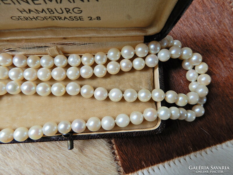 Real pearls with 14 carat filigree gold clasp