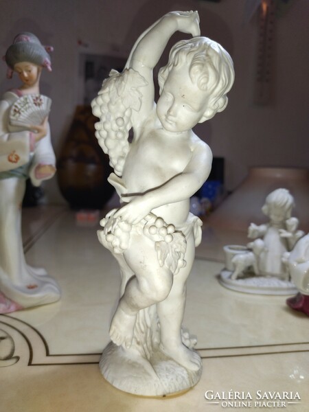 4 Piece ceramic figure sculpture