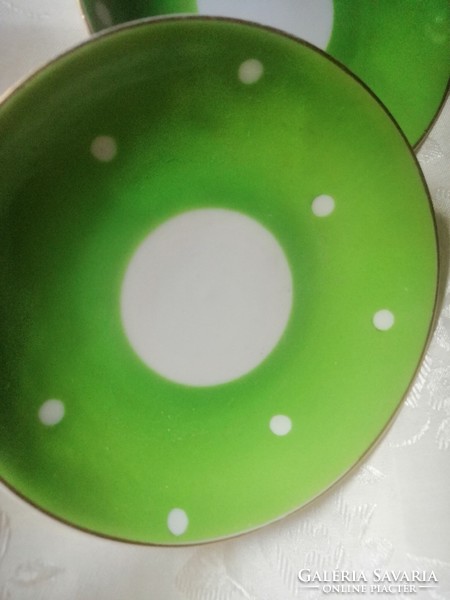 Pair of green and white speckled coffee coasters