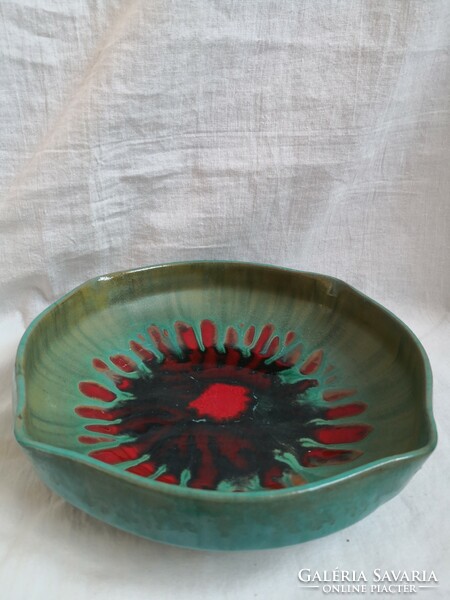 Charles Ban in a ceramic bowl