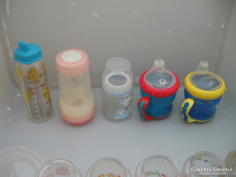 Plastic baby bottles, glasses, mugs with beaks