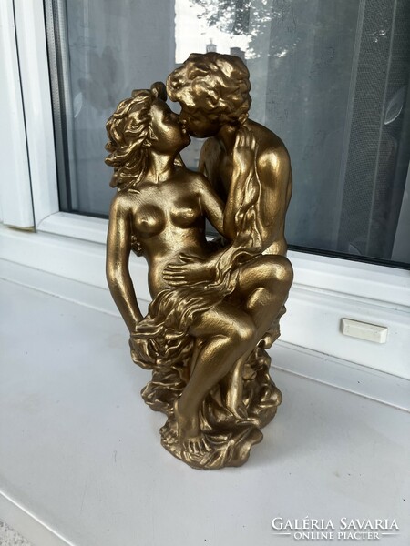 Nymph and faun statue