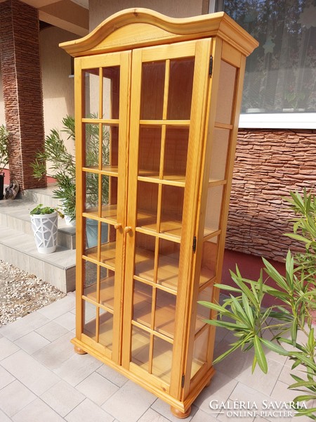 For sale is a Sziged display cabinet furniture in good condition.