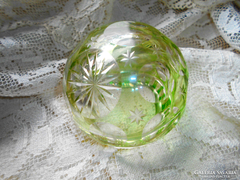 Uranium green colored thick glass ashtray with polished decoration is a beautiful handcrafted, solid piece.