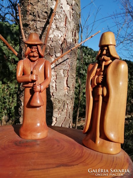A group of three-figure folk carved sculptures (the work of Zoltán Carver)