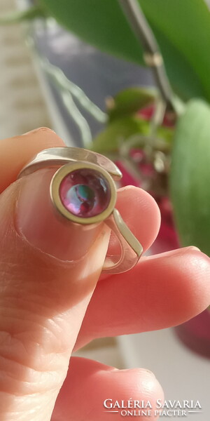 Silver ring with blue diamond and ruby ball