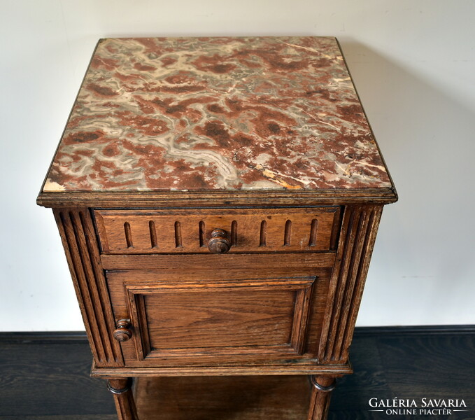 XX. The first half of Sz is a marble flat bedside cabinet!