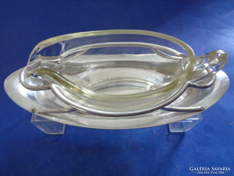 Ca 1900 in a silver-plated sauce pouring holder