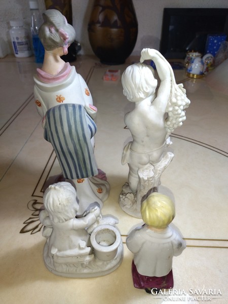 4 Piece ceramic figure sculpture